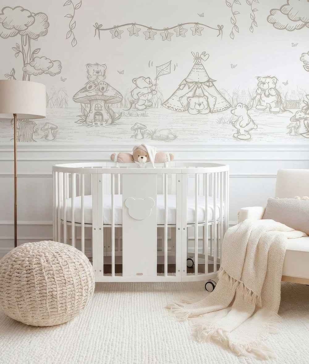 White baby cot with teddy bear design styled in a neutral nursery room