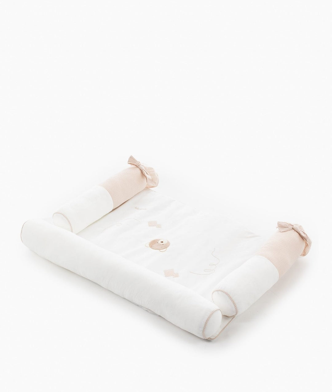 High-angle view of 4-piece changing station with rectangular base and side rails