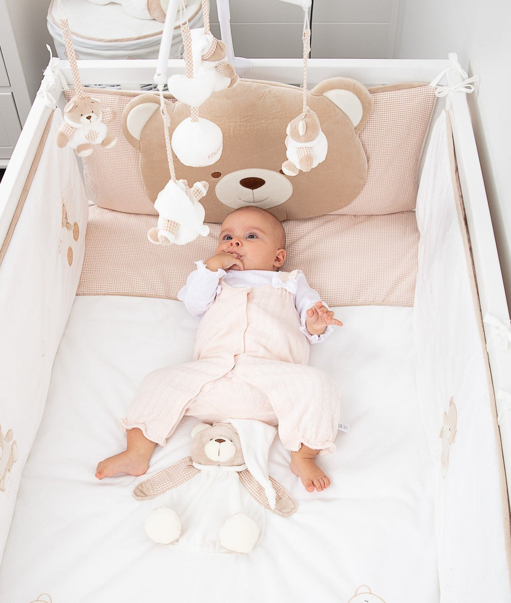 White and beige cot bumper set for baby cot