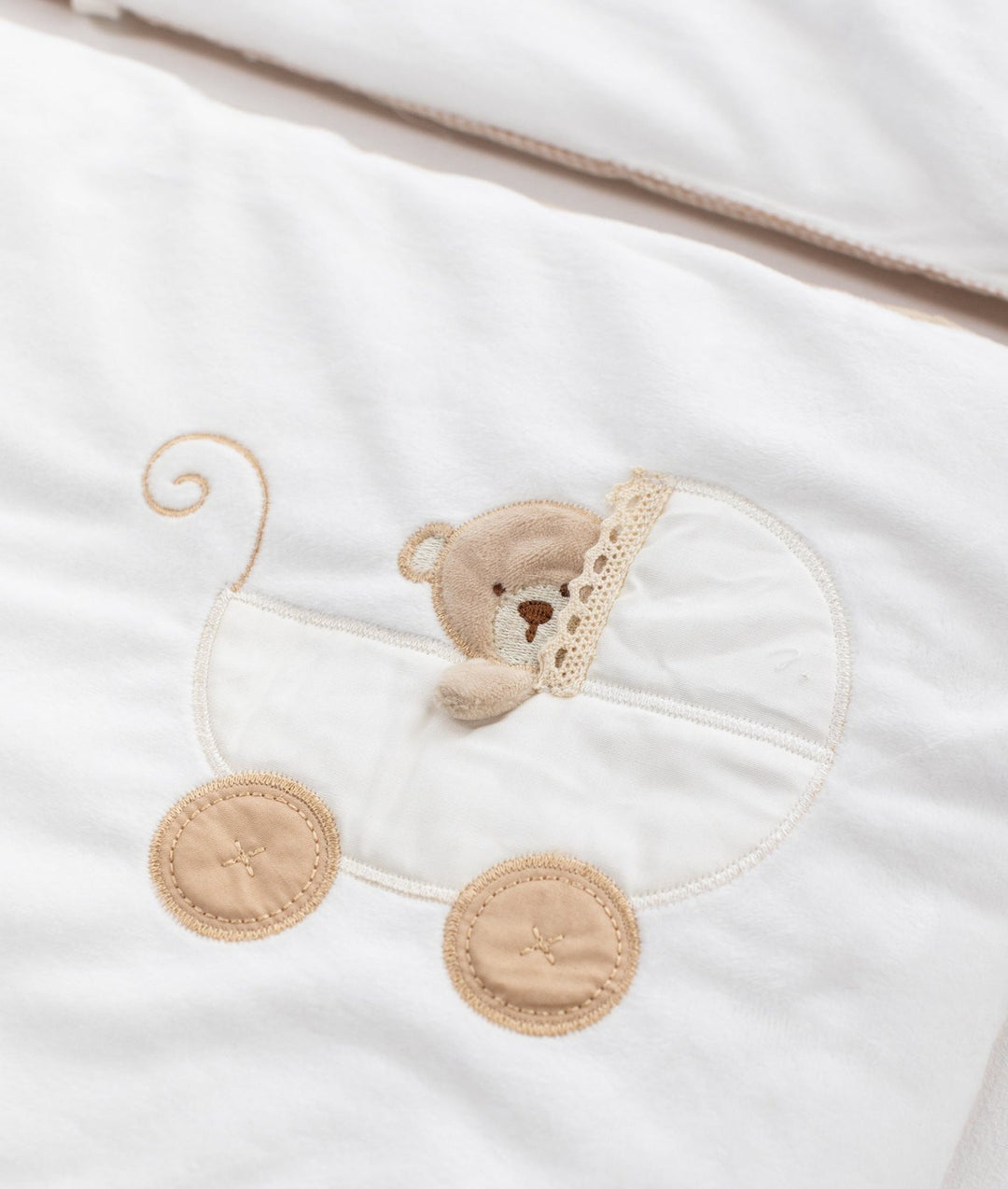 White and beige cot bumper set for baby cot