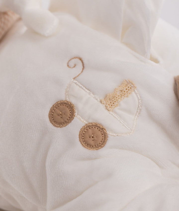 White soft bear nappy organizer featuring embroidered tan pram design detail