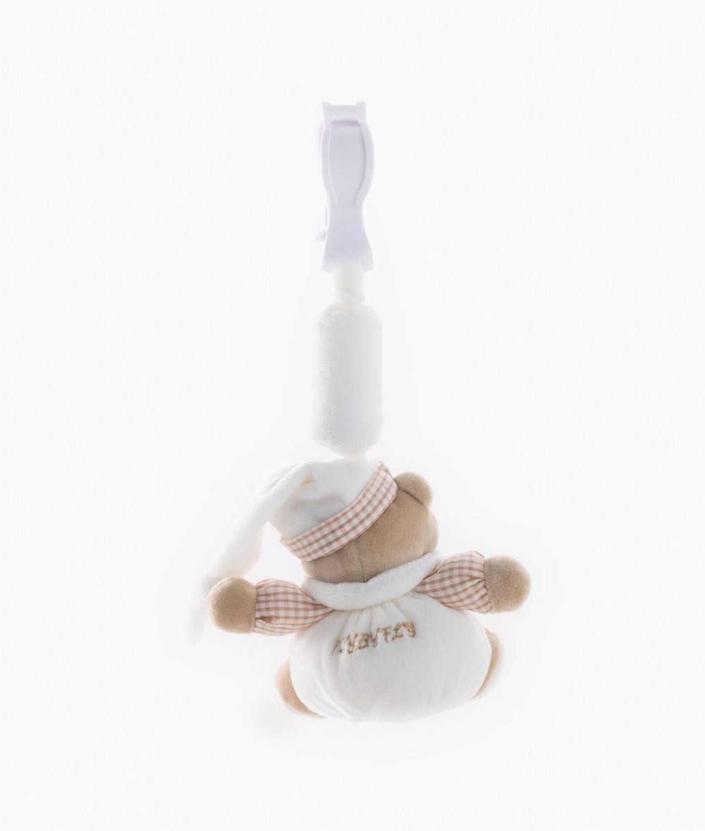 Back view of beige sensory bear toy showing embroidered text and pink gingham details