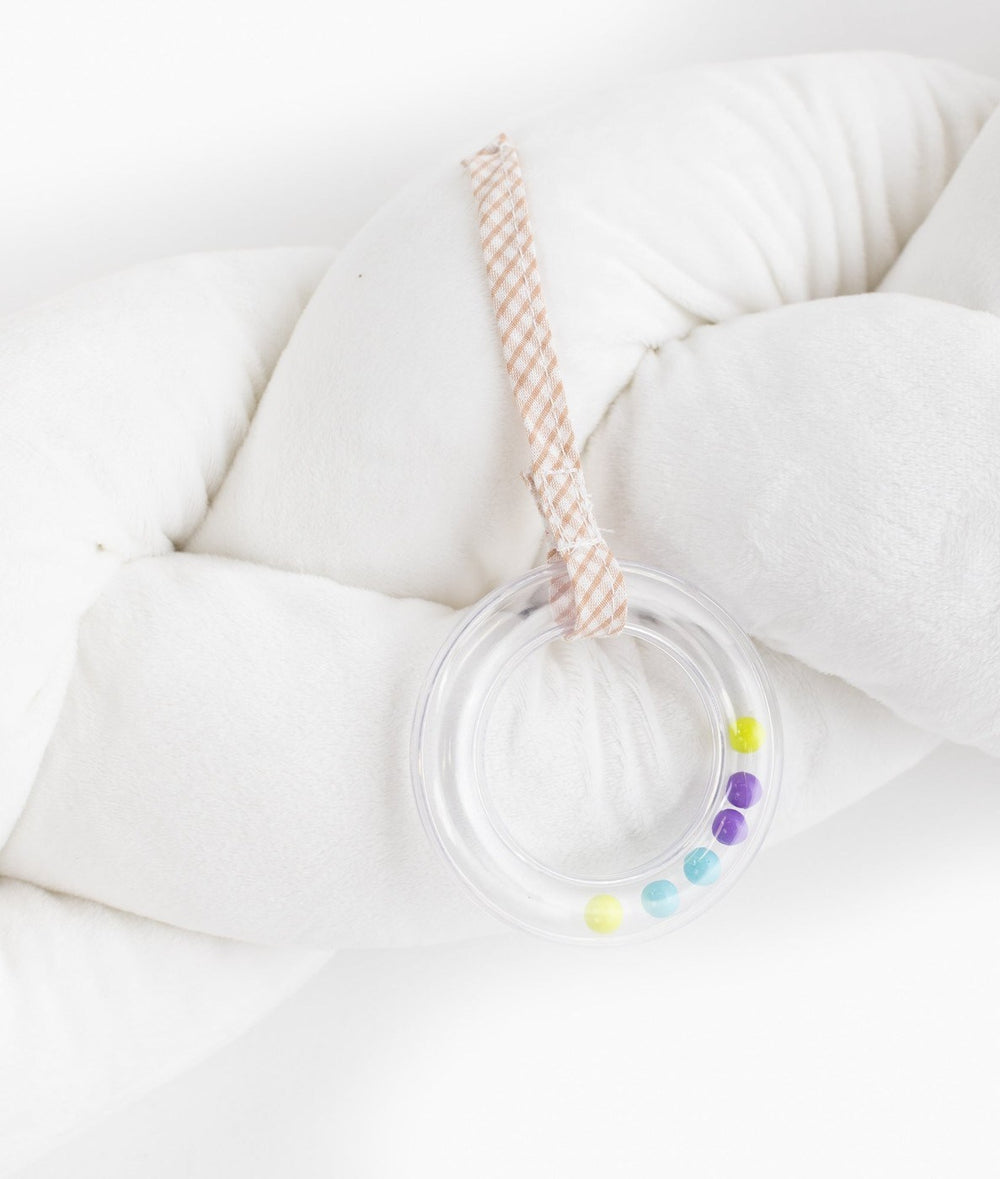 Braided toddler bolster in white and beige