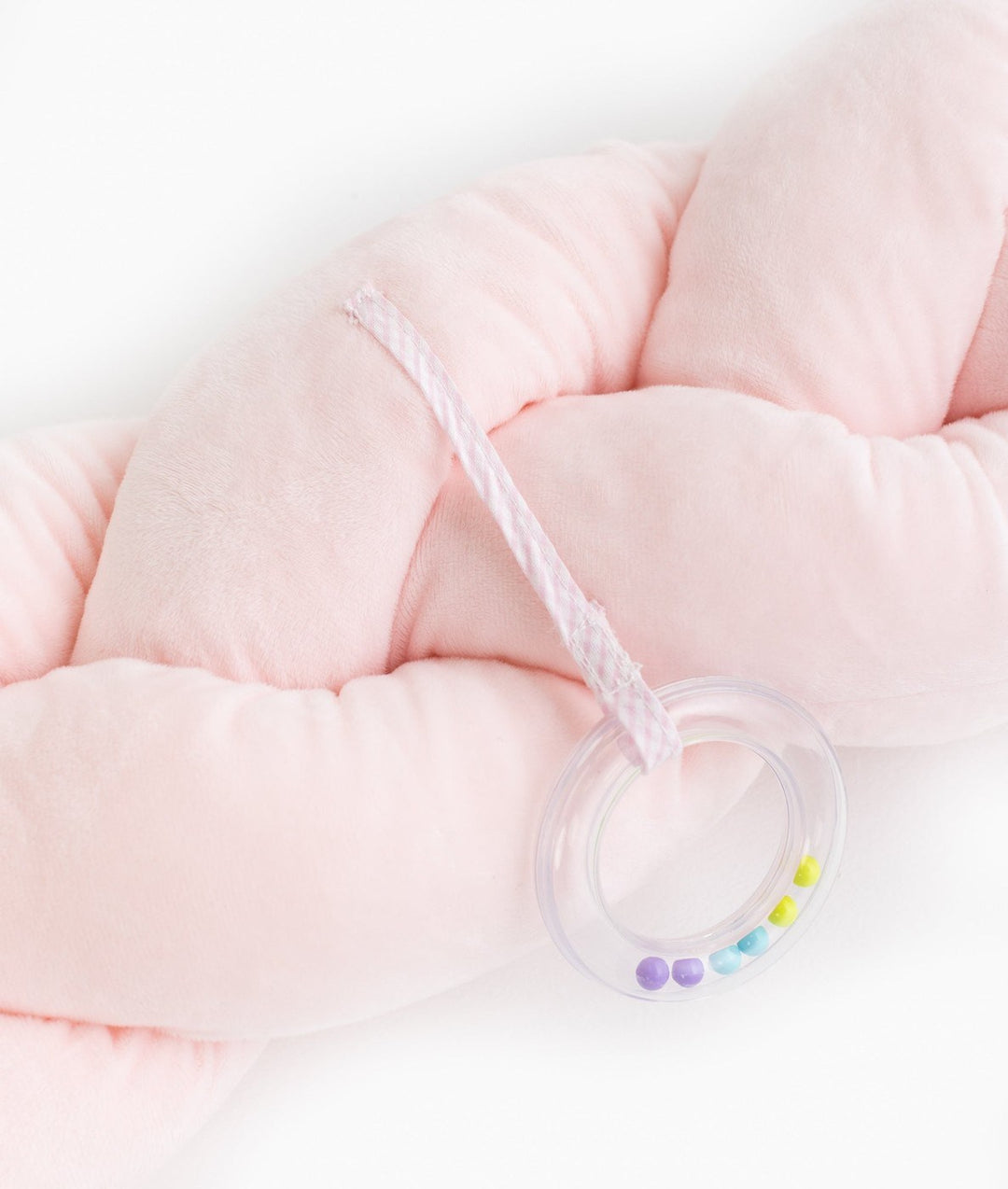 Braided toddler bolster in pink