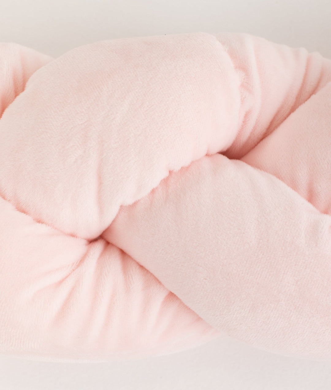 Braided toddler bolster in pink