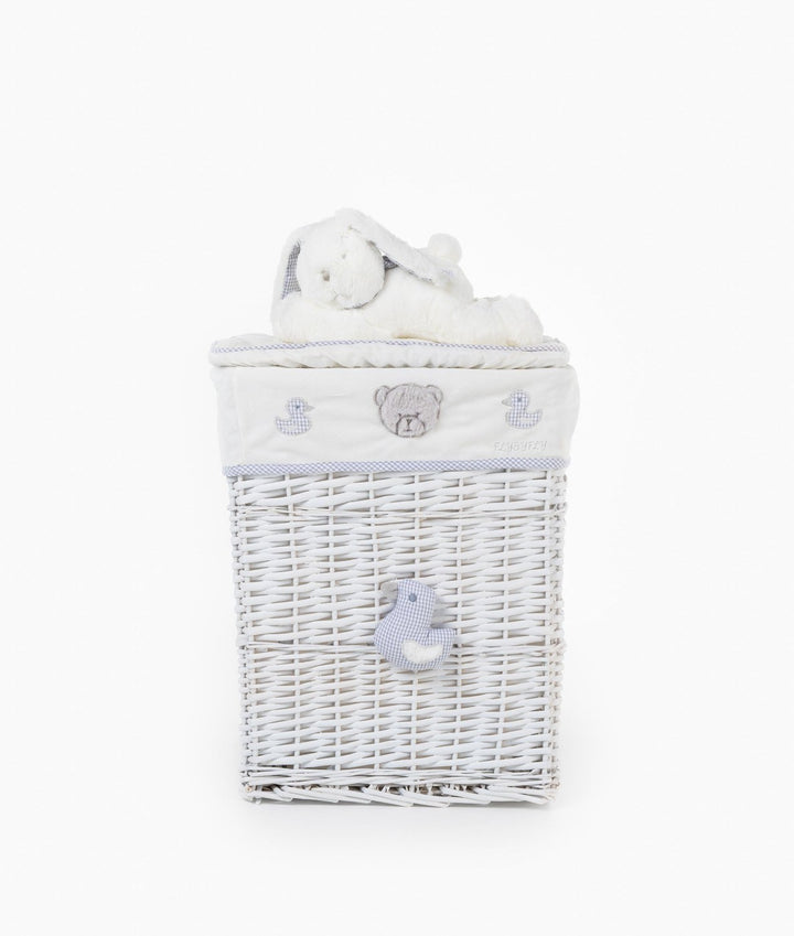 Front view of wicker basket set with bear and duck embroidery, side accent, and bunny toy on lid