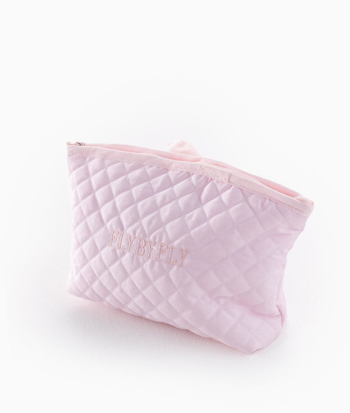 Back view of pink quilted bag with embroidered FLYBYFLY brand logo