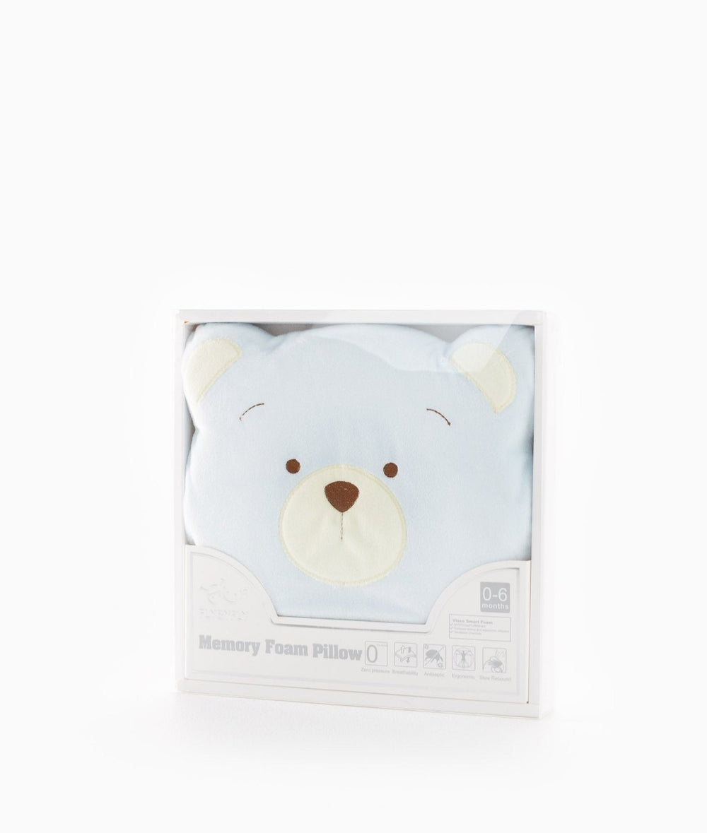 Light blue bear-shaped memory foam pillow in white retail box labeled for 0-6 months infants