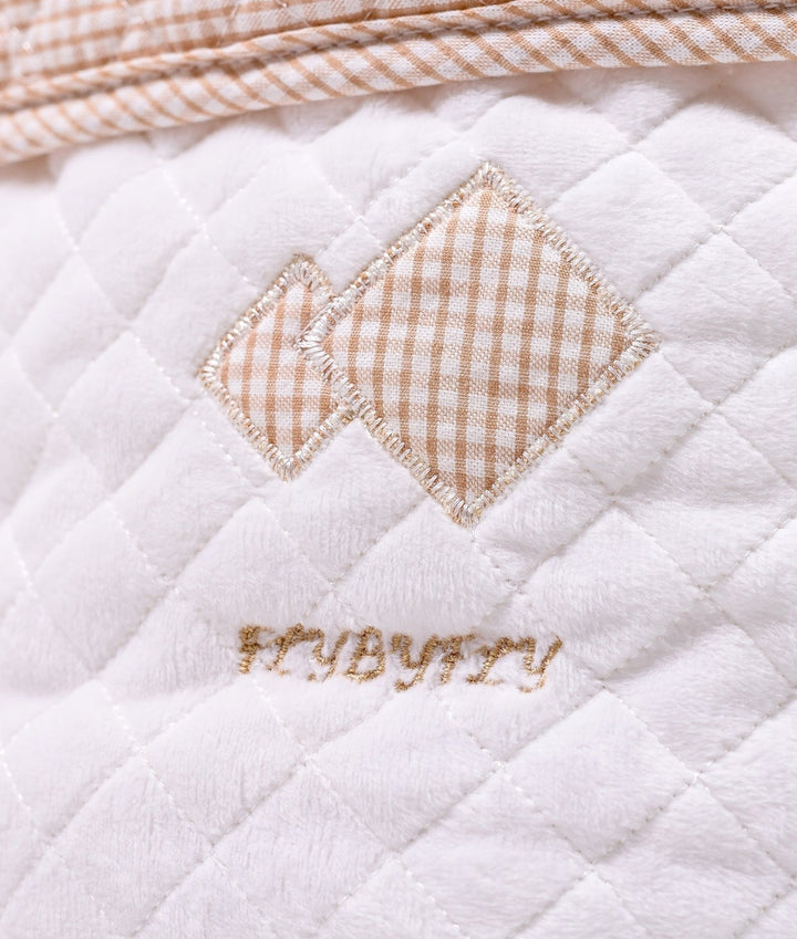 Baby nappy caddy for nursery in white and beige