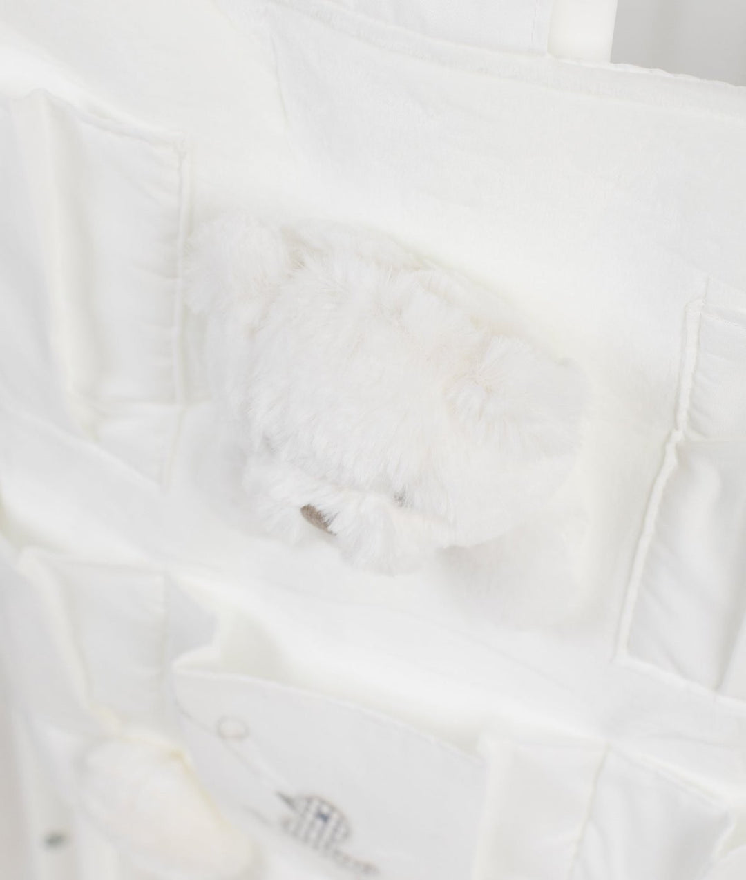 Baby nursery organiser in white and grey