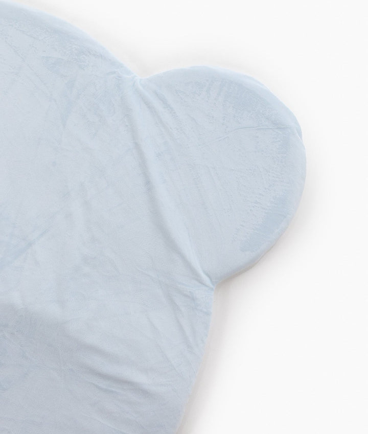 Light blue bear head playmat close-up showing soft silky fabric texture and rounded ear contour