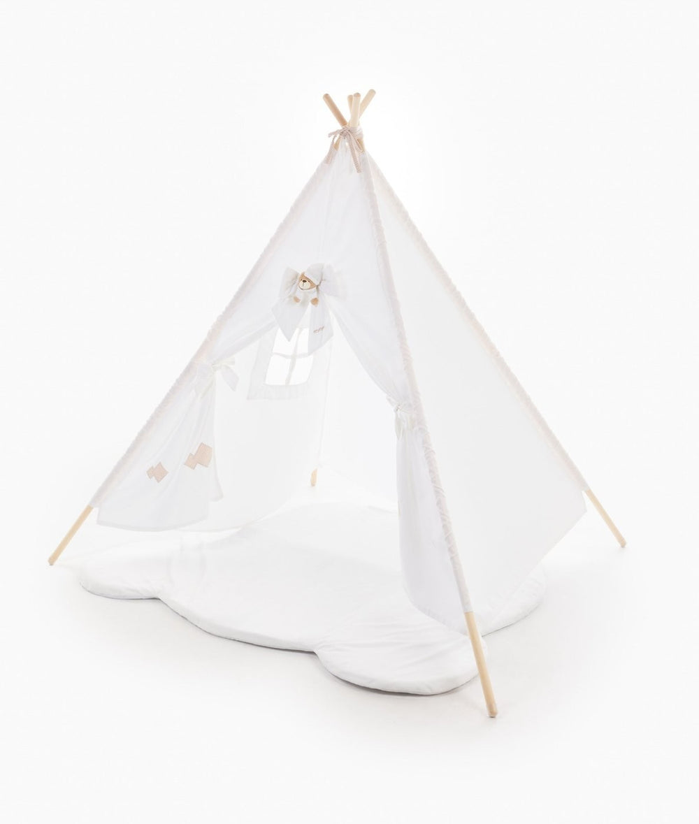 White play teepee tent on cloud cushion with bear accent