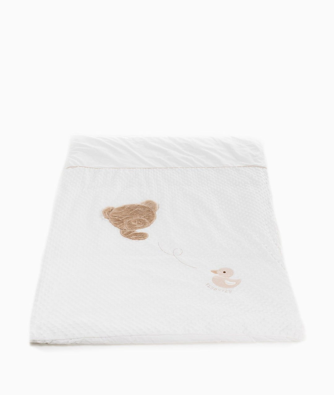 White and beige toddler bubble quilt and cover set