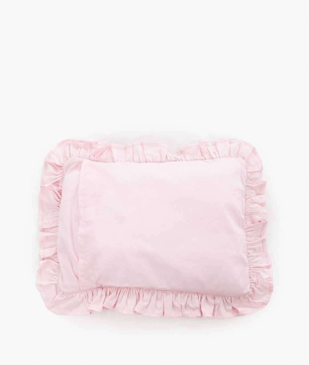 Back view of pink ruffle bedding pillow showing gathered trim around all sides