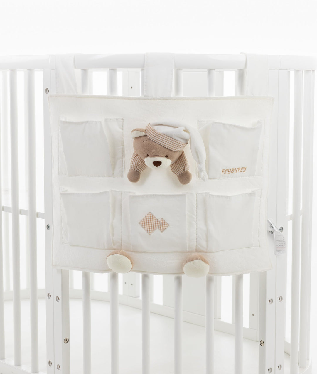 Baby nursery organiser in white and beige