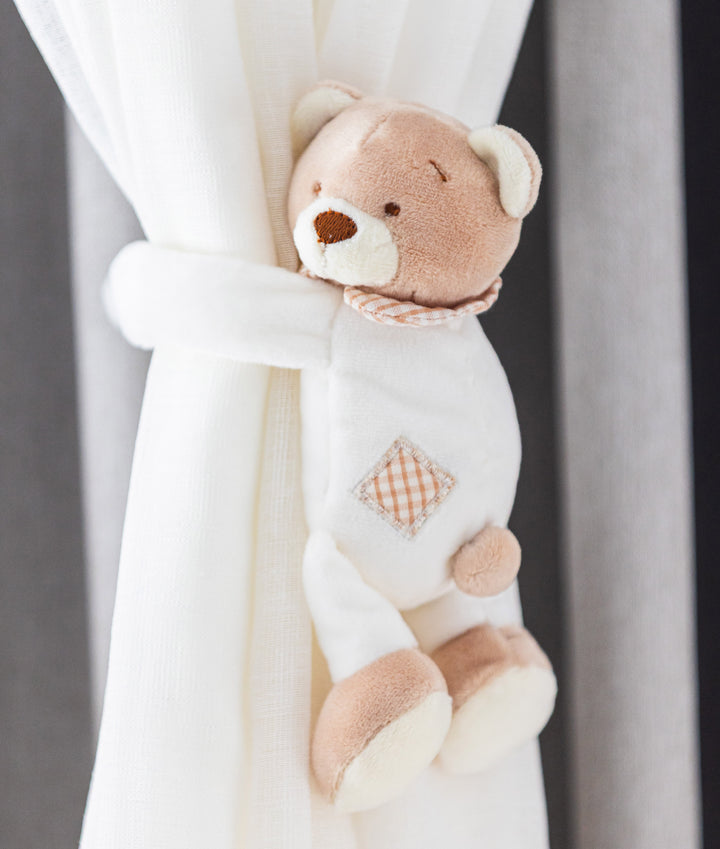Beige and white bear curtain tieback for nursery