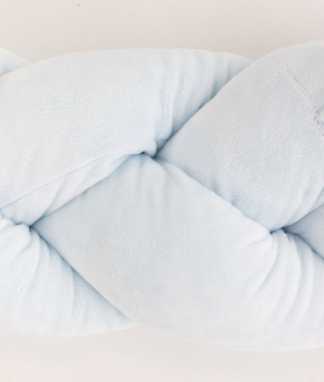Braided toddler bolster in blue