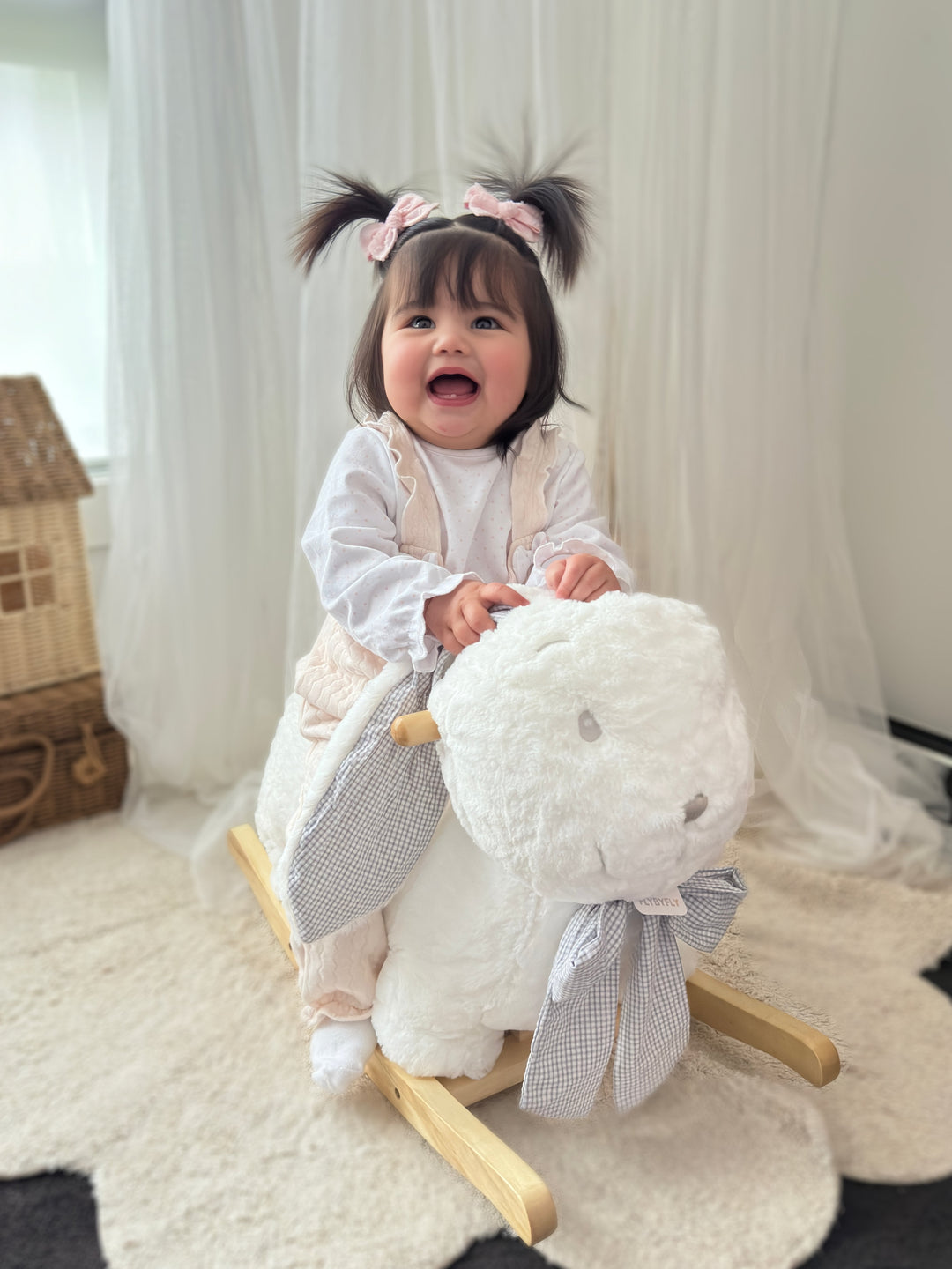 Soft rocking bunny with wooden rocker base