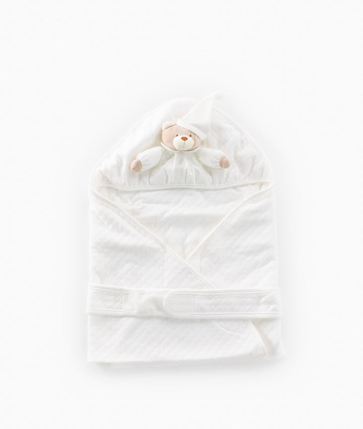 White and beige newborn swaddle blanket
