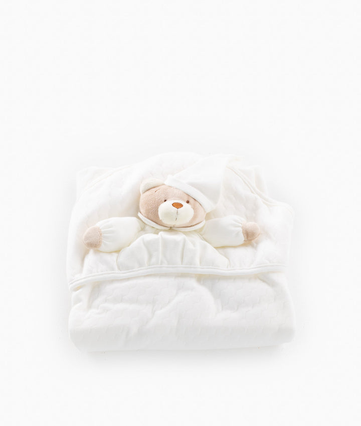 White and beige newborn swaddle blanket
